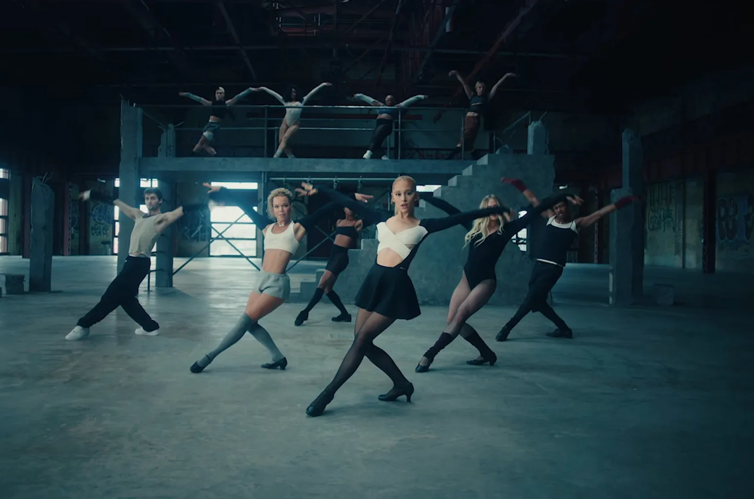 Ariana Grande pays tribute to “Cold Hearted” — archival imagery