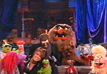 The Muppets join Paula on stage.